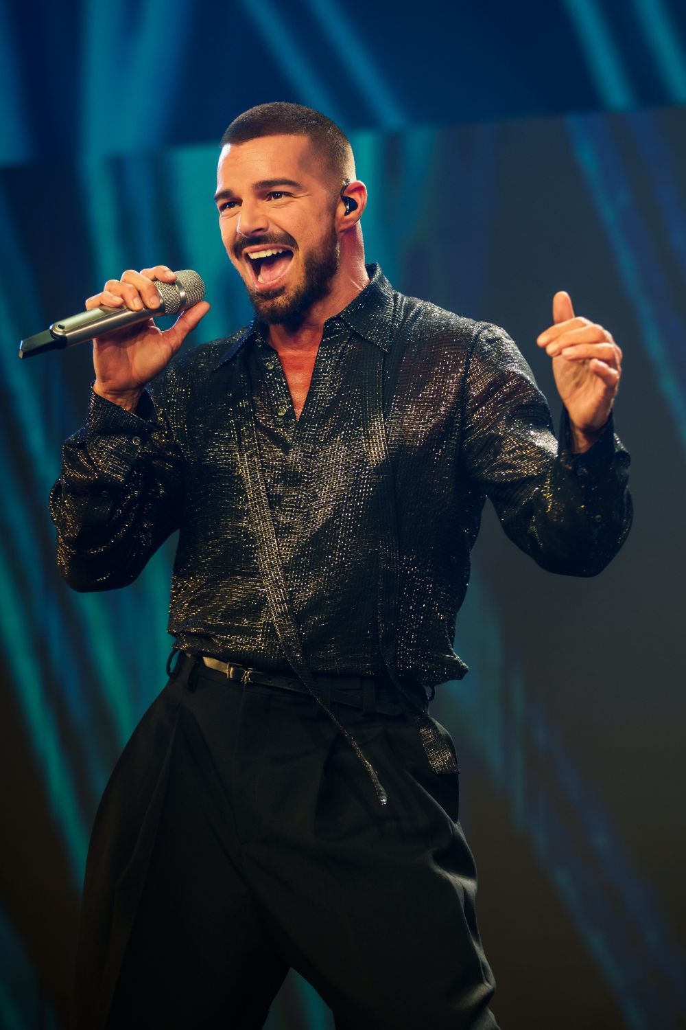 1774510174 Ricky Martin 26